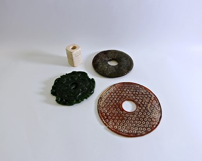Lot 531 - A CHINESE HARDSTONE CONG AND A BI DISC