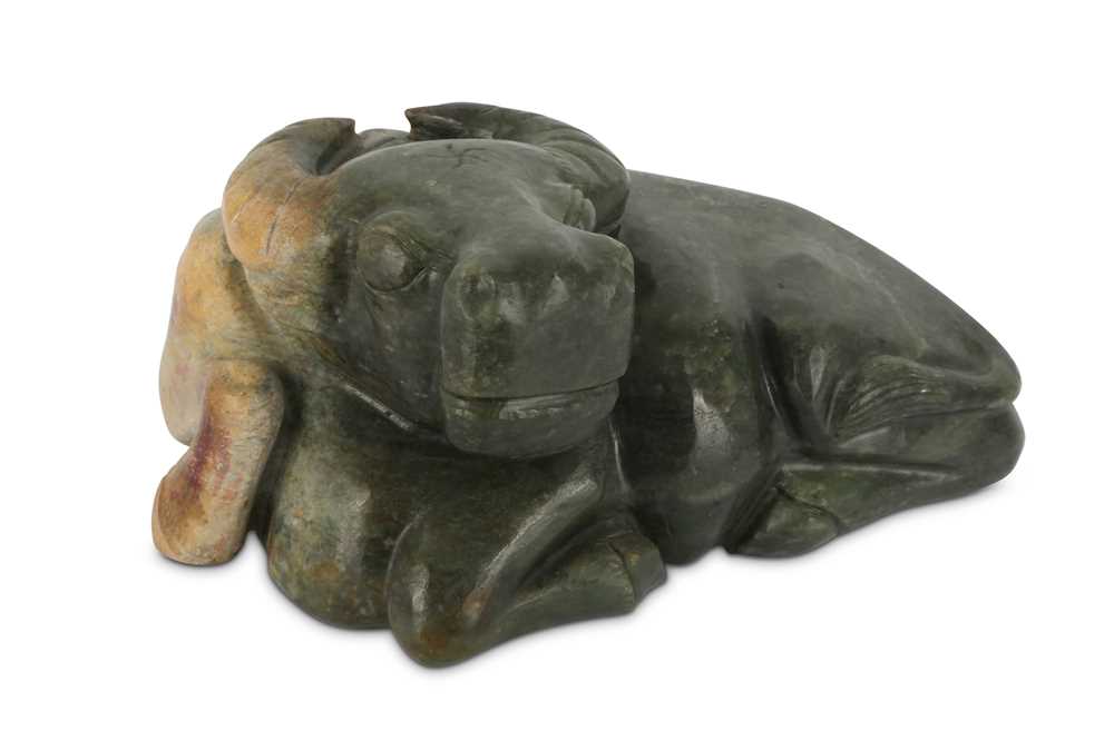 Lot 779 - A CHINESE CELADON JADE MODEL OF AN OX.