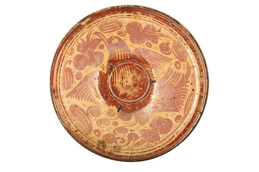 Lot 86 - A SMALL HISPANO-MORESQUE COPPER LUSTRE-PAINTED POTTERY DISH