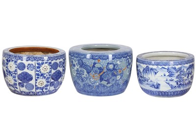 Lot 296 - THREE CHINESE BLUE AND WHITE PORCELAIN BARREL FORM JARDINIERES, LATE 19TH/EARLY 20TH CENTURY