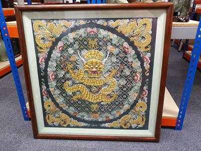 Lot 276 - A CHINESE SQUARE BLACK-GROND EMBROIDERED SILK 'DRAGON' PANEL.