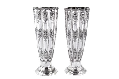 Lot 202 - A pair of tall mid-20th century Iranian (Persian) 840 standard silver vases, Isfahan 1969-78 mark of Bagher Parvaresh (c.1910-1978, master 1928), retailed by Khosrov