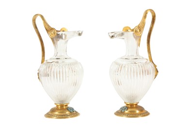 Lot 202 - A PAIR OF CONTINENTAL CLASSICAL FORM BRONZE AND GLASS EWERS, LATE 19TH CENTURY