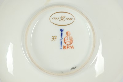 Lot 281 - A KPM CUP AND SAUCER, EARLY 20TH CENTURY