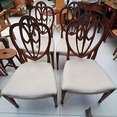 Lot 572 - A SET OF FOUR GEORGE III MAHOGANY HEPPLEWHITE DESIGN DINING CHAIRS