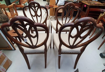 Lot 572 - A SET OF FOUR GEORGE III MAHOGANY HEPPLEWHITE DESIGN DINING CHAIRS