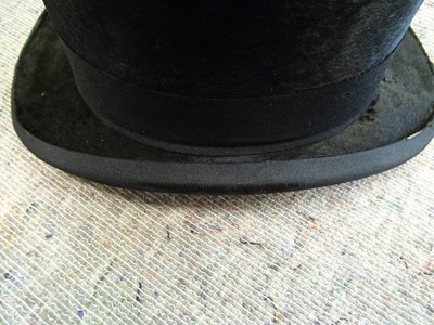 Lot 175 - A BLACK TOP HAT BY JOSEPH POTTER