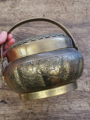 Lot 21 - A CHINESE BRONZE 'EIGHT IMMORTALS' HANDWARMER AND COVER.