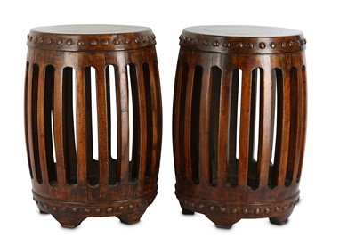 Lot 259 - A PAIR OF CHINESE HARDWOOD BARREL-SHAPED STOOLS.