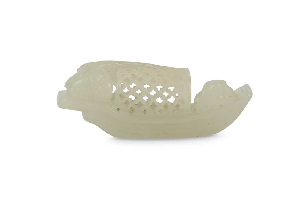 Lot 128 - A SMALL CHINESE WHITE JADE MODEL OF A BOAT.