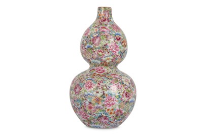 Lot 549 - A CHINESE FAMILLE ROSE 'MILLEFLEURS' DOUBLE GOURD VASE.