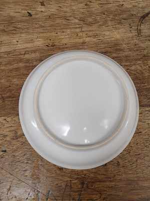 Lot 526 - A CHINESE ANHUA-DECORATED WHITE-GLAZED SAUCER.