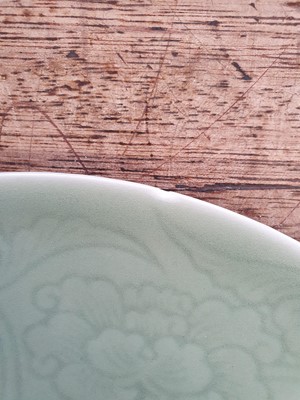 Lot 494 - A CHINESE CELADON 'BLOSSOMS' BOWL.