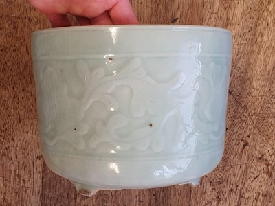 Lot 323 - A CHINESE CELADON-GLAZED JARDINIERE.