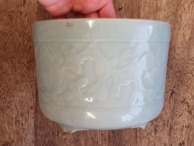 Lot 323 - A CHINESE CELADON-GLAZED JARDINIERE.