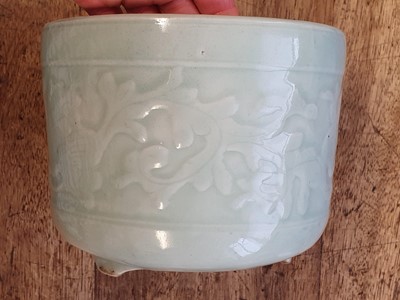 Lot 323 - A CHINESE CELADON-GLAZED JARDINIERE.