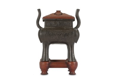 Lot 110 - A CHINESE BRONZE 'TAOTIE' INCENSE BURNER.