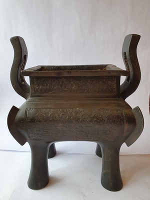 Lot 110 - A CHINESE BRONZE 'TAOTIE' INCENSE BURNER.