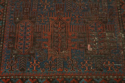 Lot 81 - AN ANTIQUE BALOUCH CARPET, NORTH-EAST PERSIA