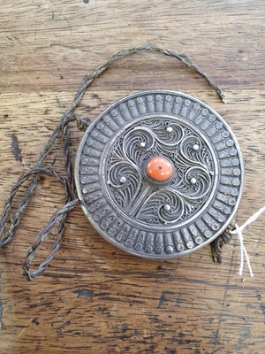 Lot 753 - λ THREE TIBETAN CIRCULAR SILVER GAU.