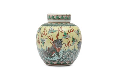 Lot 539 - A CHINESE FAMILLE VERTE 'QILIN' JAR AND COVER.