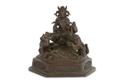 Lot 119 - A CHINESE BRONZE MODEL OF GUANYIN.