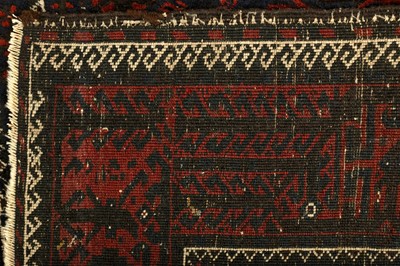 Lot 33 - AN ANTIQUE BALOUCH RUG, NORTH-EST PERSIA