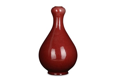 Lot 54 - A CHINESE COPPER RED-GLAZED GARLIC MOUTH VASE.