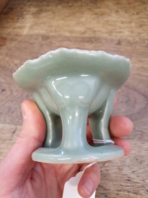 Lot 142 - A CHINESE CELADON-GLAZED 'BLOSSOM' STAND.