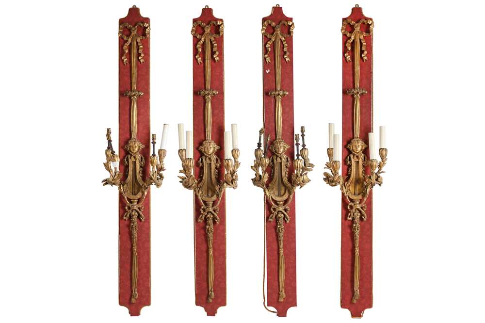 Lot 116 - A SET OF FOUR LARGE AND IMPRESSIVE BELLE EPOQUE STYLE GILTWOOD WALL APPLIQUES