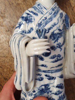 Lot 62 - A CHINESE BLUE AND WHITE FIGURE OF AN IMMORTAL.