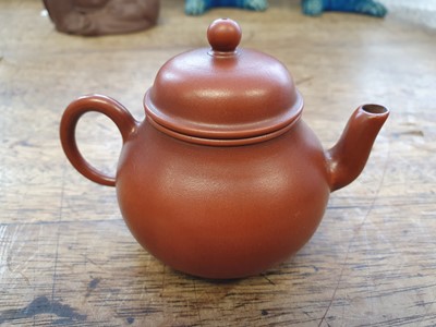 Lot 442 - A CHINESE YIXING ZISHA TEAPOT AND COVER.