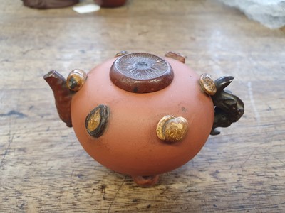 Lot 65 - A CHINESE YIXING ZISHA 'NUTS' TEAPOT AND COVER.