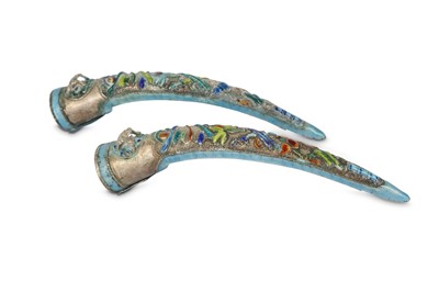 Lot 422 - A PAIR OF CHINESE SILVER ENAMELLED FINGER GUARDS.