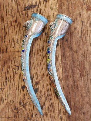 Lot 422 - A PAIR OF CHINESE SILVER ENAMELLED FINGER GUARDS.