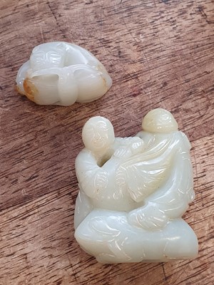 Lot 125 - TWO CHINESE PALE CELADON JADE CARVINGS.