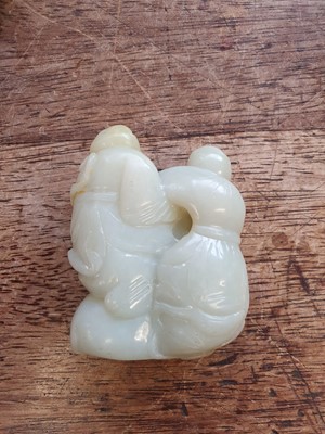 Lot 125 - TWO CHINESE PALE CELADON JADE CARVINGS.