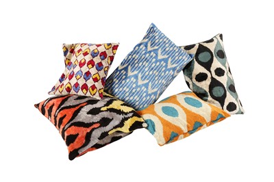 Lot 368 - A COLLECTION OF FIVE IKAT DESIGN CUSHIONS, 20TH CENTURY