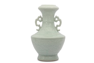 Lot 178 - A CHINESE PALE CELADON-GLAZED 'PEONIES' VASE.