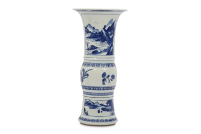 Lot 555 - A CHINESE BLUE AND WHITE GU.