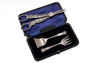 Lot 296 - A pair of Victorian sterling silver grape scissors, Sheffield 1887 by James Dixon and Sons