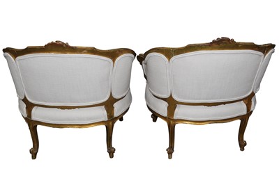 Lot 551 - A PAIR OF FRENCH LOUIS XVI STYLE CARVED GILTWOOD SALON CHAIRS