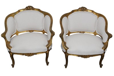 Lot 551 - A PAIR OF FRENCH LOUIS XVI STYLE CARVED GILTWOOD SALON CHAIRS