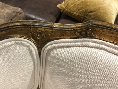 Lot 551 - A PAIR OF FRENCH LOUIS XVI STYLE CARVED GILTWOOD SALON CHAIRS