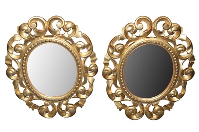 Lot 583 - A PAIR OF ITALIAN FLORENTINE FRAME OVAL GILT WOOD MIRRORS, LATE 19TH/ EARLY 20TH CENTURY