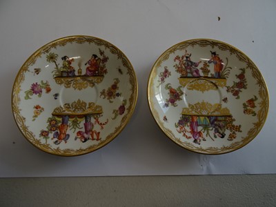Lot 247 - THREE CONTINENTAL PORCELAIN GILT AND PAINTED TEA CUPS, LATE 19TH CENTURY