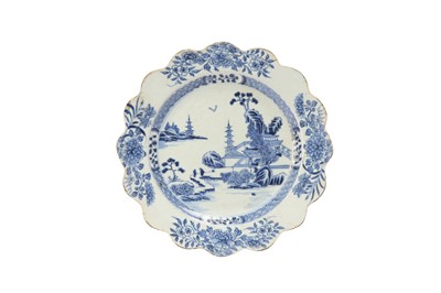 Lot 660 - A CHINESE BLUE AND WHITE 'LANDSCAPE' DISH.