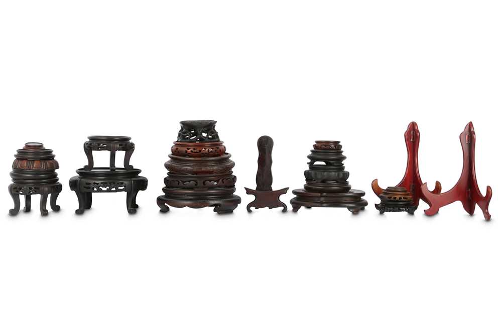 Lot 698 - A SMALL COLLECTION OF CHINESE WOOD STANDS.
