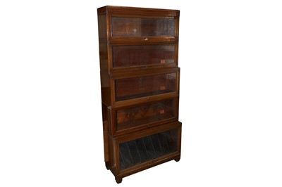Lot 560 - A GLOBE WERNIKCE 'CLASSIC' FIVE TIER WALNUT SECTIONAL STACKING WATERFALL BOOKCASE