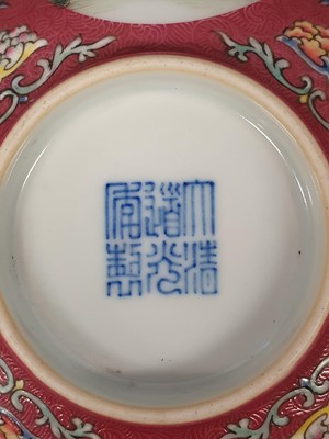 Lot 679 - A CHINESE FAMILLE ROSE RUBY-GROUND MEDALION BOWL.
